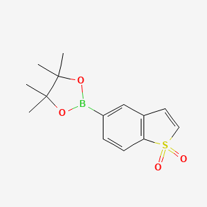 molecular formula C14H17BO4S B2632857 5-(4,4,5,5-tetramethyl-1,3,2-dioxaborolan-2-yl)-1-benzothiophene 1,1-dioxide CAS No. 1607838-41-4