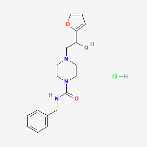 molecular formula C18H24ClN3O3 B2633193 N-BENZYL-4-[2-(FURAN-2-YL)-2-HYDROXYETHYL]PIPERAZINE-1-CARBOXAMIDE HYDROCHLORIDE CAS No. 1396875-82-3