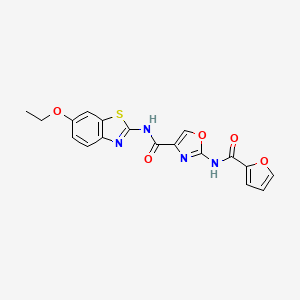 molecular formula C18H14N4O5S B2633794 N-(6-ethoxy-1,3-benzothiazol-2-yl)-2-(furan-2-amido)-1,3-oxazole-4-carboxamide CAS No. 1286709-50-9