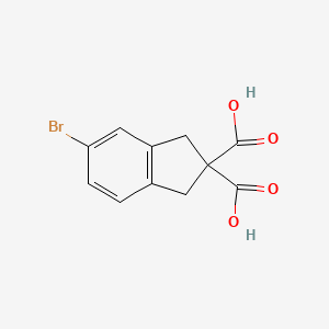 molecular formula C11H9BrO4 B2634168 5-Bromo-1,3-dihydroindene-2,2-dicarboxylic acid CAS No. 1446757-57-8