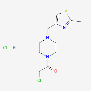 molecular formula C11H17Cl2N3OS B2635585 2-chloro-1-{4-[(2-methyl-1,3-thiazol-4-yl)methyl]piperazin-1-yl}ethan-1-one hydrochloride CAS No. 2138534-27-5
