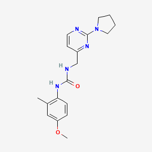 B2636719 1-(4-Methoxy-2-methylphenyl)-3-((2-(pyrrolidin-1-yl)pyrimidin-4-yl)methyl)urea CAS No. 1797656-29-1