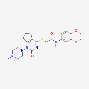 molecular formula C22H27N5O4S B2637256 N-(2,3-dihydro-1,4-benzodioxin-6-yl)-2-{[1-(4-methylpiperazin-1-yl)-2-oxo-1H,2H,5H,6H,7H-cyclopenta[d]pyrimidin-4-yl]sulfanyl}acetamide CAS No. 899992-92-8