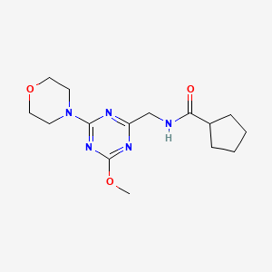 molecular formula C15H23N5O3 B2637527 N-((4-methoxy-6-morpholino-1,3,5-triazin-2-yl)methyl)cyclopentanecarboxamide CAS No. 2034541-07-4