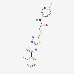 molecular formula C18H15FN4O2S2 B2639759 N-[5-({[(4-fluorophenyl)carbamoyl]methyl}sulfanyl)-1,3,4-thiadiazol-2-yl]-2-methylbenzamide CAS No. 392297-52-8