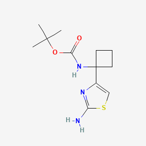 Tert-butyl N-[1-(2-amino-1,3-thiazol-4-yl)cyclobutyl]carbamate