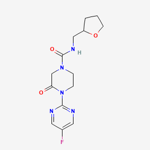 4-(5-Fluoropyrimidin-2-yl)-3-oxo-N-(oxolan-2-ylmethyl)piperazine-1-carboxamide