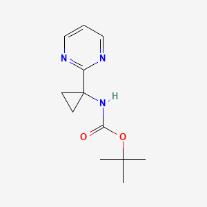 molecular formula C12H17N3O2 B2643973 tert-Butyl (1-(pyrimidin-2-yl)cyclopropyl)carbamate CAS No. 1159734-40-3