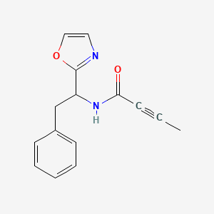 molecular formula C15H14N2O2 B2644371 N-[1-(1,3-Oxazol-2-yl)-2-phenylethyl]but-2-ynamide CAS No. 2411199-45-4