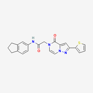 molecular formula C21H18N4O2S B2645784 N-(2,3-dihydro-1H-inden-5-yl)-2-(4-oxo-2-(thiophen-2-yl)pyrazolo[1,5-a]pyrazin-5(4H)-yl)acetamide CAS No. 1428374-99-5