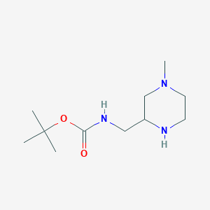 molecular formula C11H23N3O2 B2648039 tert-butyl N-[(4-methylpiperazin-2-yl)methyl]carbamate CAS No. 1368054-23-2