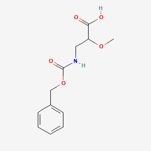 molecular formula C12H15NO5 B2648701 2-Methoxy-3-(phenylmethoxycarbonylamino)propanoic acid CAS No. 1691758-26-5
