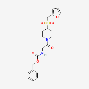 Benzyl (2-(4-((furan-2-ylmethyl)sulfonyl)piperidin-1-yl)-2-oxoethyl)carbamate