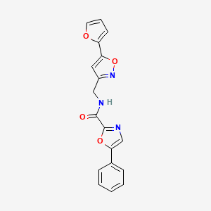 molecular formula C18H13N3O4 B2649221 N-((5-(furan-2-yl)isoxazol-3-yl)methyl)-5-phenyloxazole-2-carboxamide CAS No. 1208789-75-6