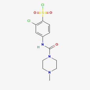molecular formula C12H15Cl2N3O3S B2650094 2-Chloro-4-(4-methylpiperazine-1-carboxamido)benzenesulfonyl chloride CAS No. 725234-36-6