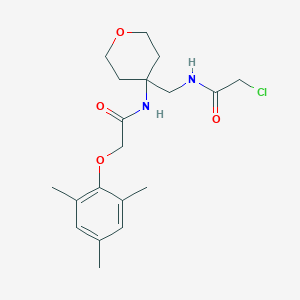 N-[4-[[(2-Chloroacetyl)amino]methyl]oxan-4-yl]-2-(2,4,6-trimethylphenoxy)acetamide