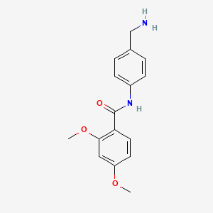 molecular formula C16H18N2O3 B2650770 N-[4-(Aminomethyl)phenyl]-2,4-dimethoxybenzamide CAS No. 1016520-09-4