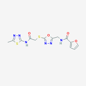 molecular formula C13H12N6O4S2 B2651021 N-{[5-({[(5-methyl-1,3,4-thiadiazol-2-yl)carbamoyl]methyl}sulfanyl)-1,3,4-oxadiazol-2-yl]methyl}furan-2-carboxamide CAS No. 851862-07-2