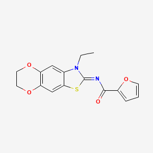 molecular formula C16H14N2O4S B2652165 N-[(5E)-6-ethyl-10,13-dioxa-4-thia-6-azatricyclo[7.4.0.0^{3,7}]trideca-1,3(7),8-trien-5-ylidene]furan-2-carboxamide CAS No. 1321720-71-1
