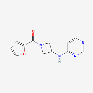 N-[1-(furan-2-carbonyl)azetidin-3-yl]pyrimidin-4-amine