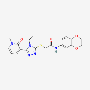 molecular formula C20H21N5O4S B2653716 N-(2,3-dihydro-1,4-benzodioxin-6-yl)-2-{[4-ethyl-5-(1-methyl-2-oxo-1,2-dihydropyridin-3-yl)-4H-1,2,4-triazol-3-yl]sulfanyl}acetamide CAS No. 1105227-79-9
