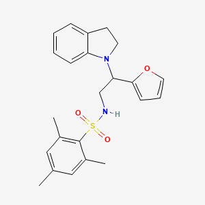 molecular formula C23H26N2O3S B2653866 N-(2-(furan-2-yl)-2-(indolin-1-yl)ethyl)-2,4,6-trimethylbenzenesulfonamide CAS No. 898458-26-9