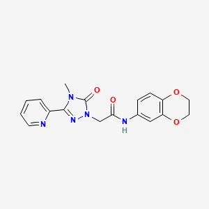 molecular formula C18H17N5O4 B2654797 N-(2,3-dihydro-1,4-benzodioxin-6-yl)-2-[4-methyl-5-oxo-3-(pyridin-2-yl)-4,5-dihydro-1H-1,2,4-triazol-1-yl]acetamide CAS No. 1798622-23-7