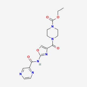 molecular formula C16H18N6O5 B2656025 Ethyl 4-(2-(pyrazine-2-carboxamido)oxazole-4-carbonyl)piperazine-1-carboxylate CAS No. 1396682-78-2