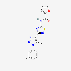 molecular formula C18H16N6O2S B2657071 N-(3-(1-(3,4-dimethylphenyl)-5-methyl-1H-1,2,3-triazol-4-yl)-1,2,4-thiadiazol-5-yl)furan-2-carboxamide CAS No. 931938-30-6