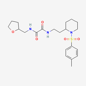 molecular formula C21H31N3O5S B2657399 N'-{2-[1-(4-methylbenzenesulfonyl)piperidin-2-yl]ethyl}-N-[(oxolan-2-yl)methyl]ethanediamide CAS No. 898450-42-5