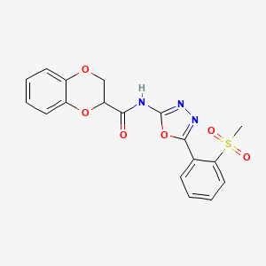 molecular formula C18H15N3O6S B2658115 N-(5-(2-(methylsulfonyl)phenyl)-1,3,4-oxadiazol-2-yl)-2,3-dihydrobenzo[b][1,4]dioxine-2-carboxamide CAS No. 886925-20-8