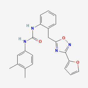 molecular formula C22H20N4O3 B2660029 1-(3,4-Dimethylphenyl)-3-(2-((3-(furan-2-yl)-1,2,4-oxadiazol-5-yl)methyl)phenyl)urea CAS No. 1797139-74-2