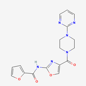 N-(4-(4-(pyrimidin-2-yl)piperazine-1-carbonyl)oxazol-2-yl)furan-2-carboxamide