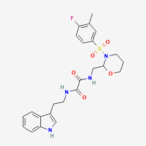 N1-(2-(1H-indol-3-yl)ethyl)-N2-((3-((4-fluoro-3-methylphenyl)sulfonyl)-1,3-oxazinan-2-yl)methyl)oxalamide