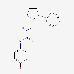 1-(4-Fluorophenyl)-3-((1-phenylpyrrolidin-2-yl)methyl)urea