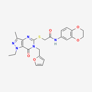 molecular formula C23H23N5O5S B2661388 N-(2,3-dihydro-1,4-benzodioxin-6-yl)-2-({1-ethyl-6-[(furan-2-yl)methyl]-3-methyl-7-oxo-1H,6H,7H-pyrazolo[4,3-d]pyrimidin-5-yl}sulfanyl)acetamide CAS No. 1359219-01-4