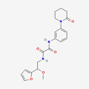 molecular formula C20H23N3O5 B2663394 N-[2-(furan-2-yl)-2-methoxyethyl]-N'-[3-(2-oxopiperidin-1-yl)phenyl]ethanediamide CAS No. 1788677-38-2