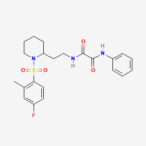 molecular formula C22H26FN3O4S B2665172 N-{2-[1-(4-fluoro-2-methylbenzenesulfonyl)piperidin-2-yl]ethyl}-N'-phenylethanediamide CAS No. 898461-56-8