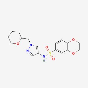 molecular formula C17H21N3O5S B2666869 N-{1-[(oxan-2-yl)methyl]-1H-pyrazol-4-yl}-2,3-dihydro-1,4-benzodioxine-6-sulfonamide CAS No. 2034613-04-0
