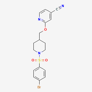 molecular formula C18H18BrN3O3S B2667193 2-[[1-(4-Bromophenyl)sulfonylpiperidin-4-yl]methoxy]pyridine-4-carbonitrile CAS No. 2379986-48-6