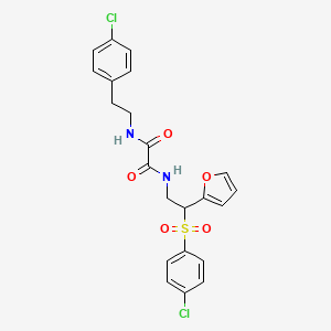 molecular formula C22H20Cl2N2O5S B2667294 N1-(4-chlorophenethyl)-N2-(2-((4-chlorophenyl)sulfonyl)-2-(furan-2-yl)ethyl)oxalamide CAS No. 896330-09-9