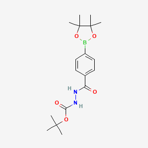 molecular formula C18H27BN2O5 B2668223 tert-Butyl 2-(4-(4,4,5,5-tetramethyl-1,3,2-dioxaborolan-2-yl)benzoyl)hydrazinecarboxylate CAS No. 2096997-10-1