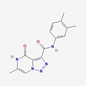 molecular formula C15H15N5O2 B2668723 N-(3,4-dimethylphenyl)-6-methyl-4-oxo-4,5-dihydro[1,2,3]triazolo[1,5-a]pyrazine-3-carboxamide CAS No. 1775528-73-8