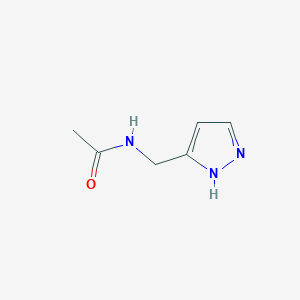molecular formula C6H9N3O B2668767 N-[(1H-pyrazol-3-yl)methyl]acetamide CAS No. 90030-58-3