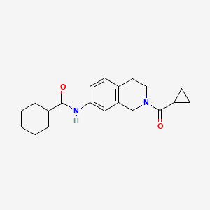 molecular formula C20H26N2O2 B2668886 N-(2-(cyclopropanecarbonyl)-1,2,3,4-tetrahydroisoquinolin-7-yl)cyclohexanecarboxamide CAS No. 955765-82-9