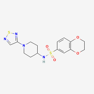 molecular formula C15H18N4O4S2 B2669470 N-[1-(1,2,5-thiadiazol-3-yl)piperidin-4-yl]-2,3-dihydro-1,4-benzodioxine-6-sulfonamide CAS No. 2034519-62-3