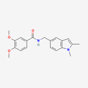 molecular formula C20H22N2O3 B2671790 N-[(1,2-dimethylindol-5-yl)methyl]-3,4-dimethoxybenzamide CAS No. 852137-26-9