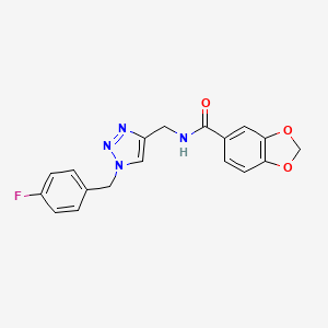 molecular formula C18H15FN4O3 B2672364 N-({1-[(4-fluorophenyl)methyl]-1H-1,2,3-triazol-4-yl}methyl)-2H-1,3-benzodioxole-5-carboxamide CAS No. 2380068-83-5