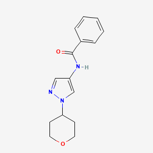molecular formula C15H17N3O2 B2675128 N-[1-(oxan-4-yl)-1H-pyrazol-4-yl]benzamide CAS No. 1448074-98-3