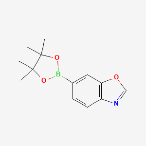 molecular formula C13H16BNO3 B2676858 6-(4,4,5,5-Tetramethyl-1,3,2-dioxaborolan-2-yl)benzo[d]oxazole CAS No. 1810038-58-4